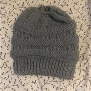 gray hat with hole for hair